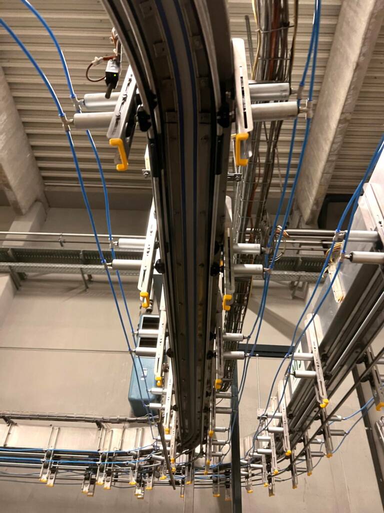 Guidage UBIC sur convoyeur à air, réalisation Accs Packaging