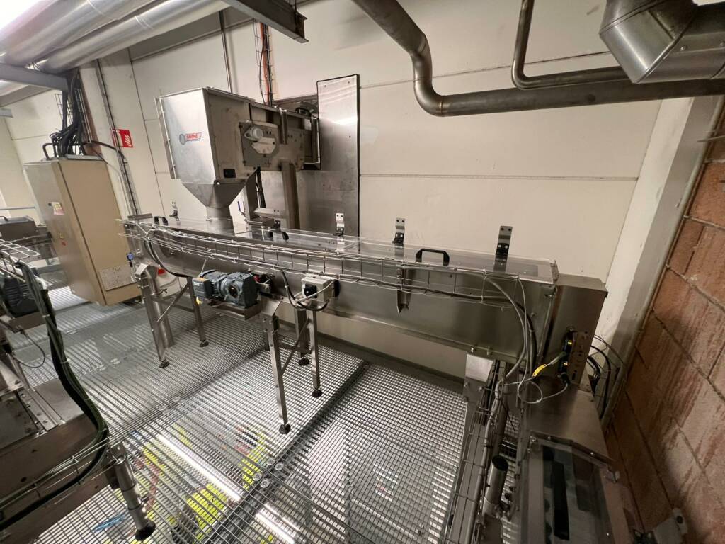 Convoyeur Mécanique Double Sens Pour Distribution De Bouchons, réalisation ACCS Packaging pour la Salvetat, groupe Danone